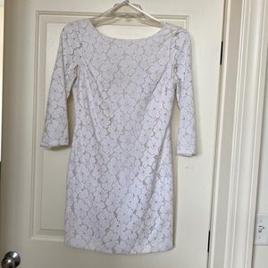 White lace mini dress by Diane Von Furstenberg size 8 but runs small.
